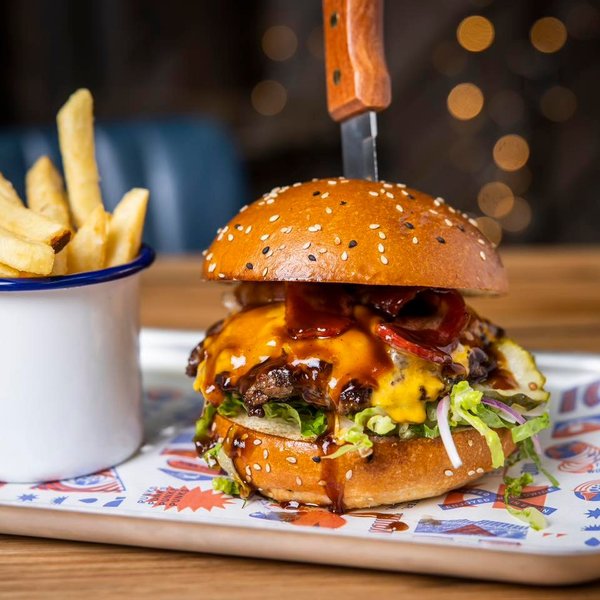 Smash burger with fries at BrewDog Bangkok Ploenchit