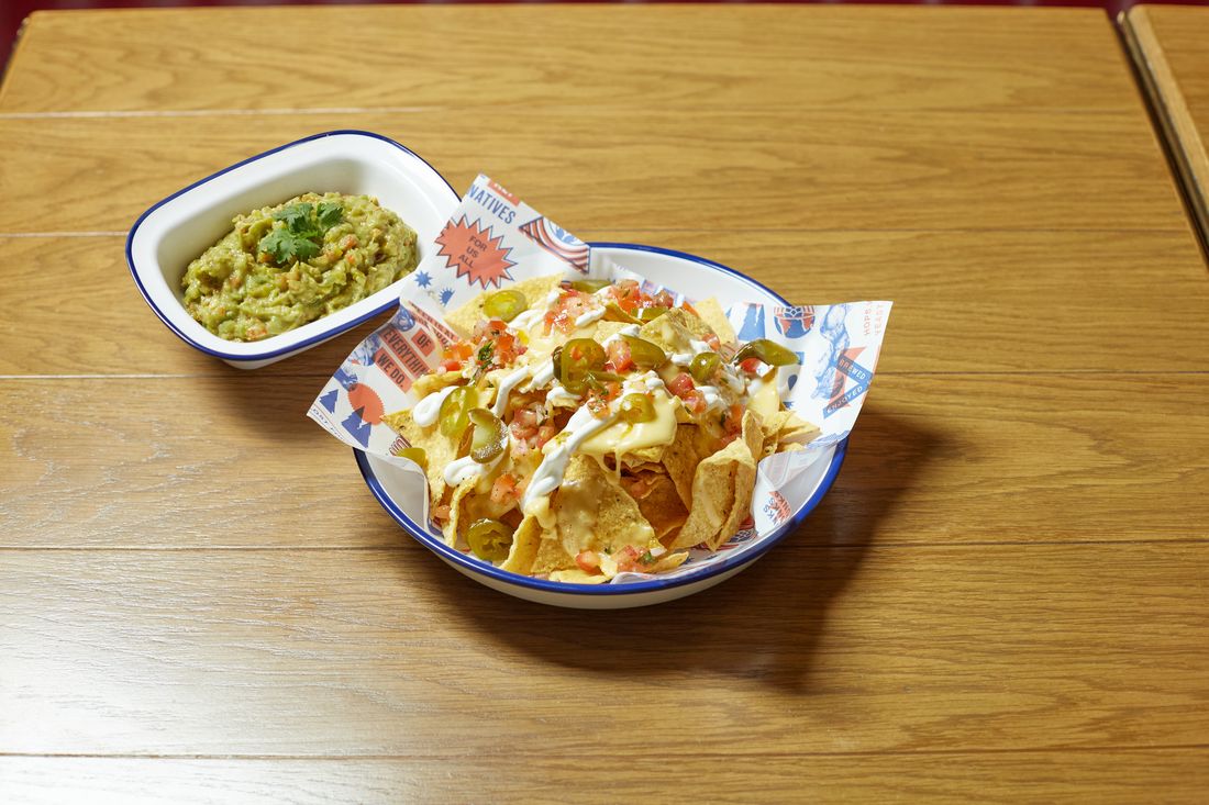 Loaded sharing nachos with guacamole at BrewDog Bangkok